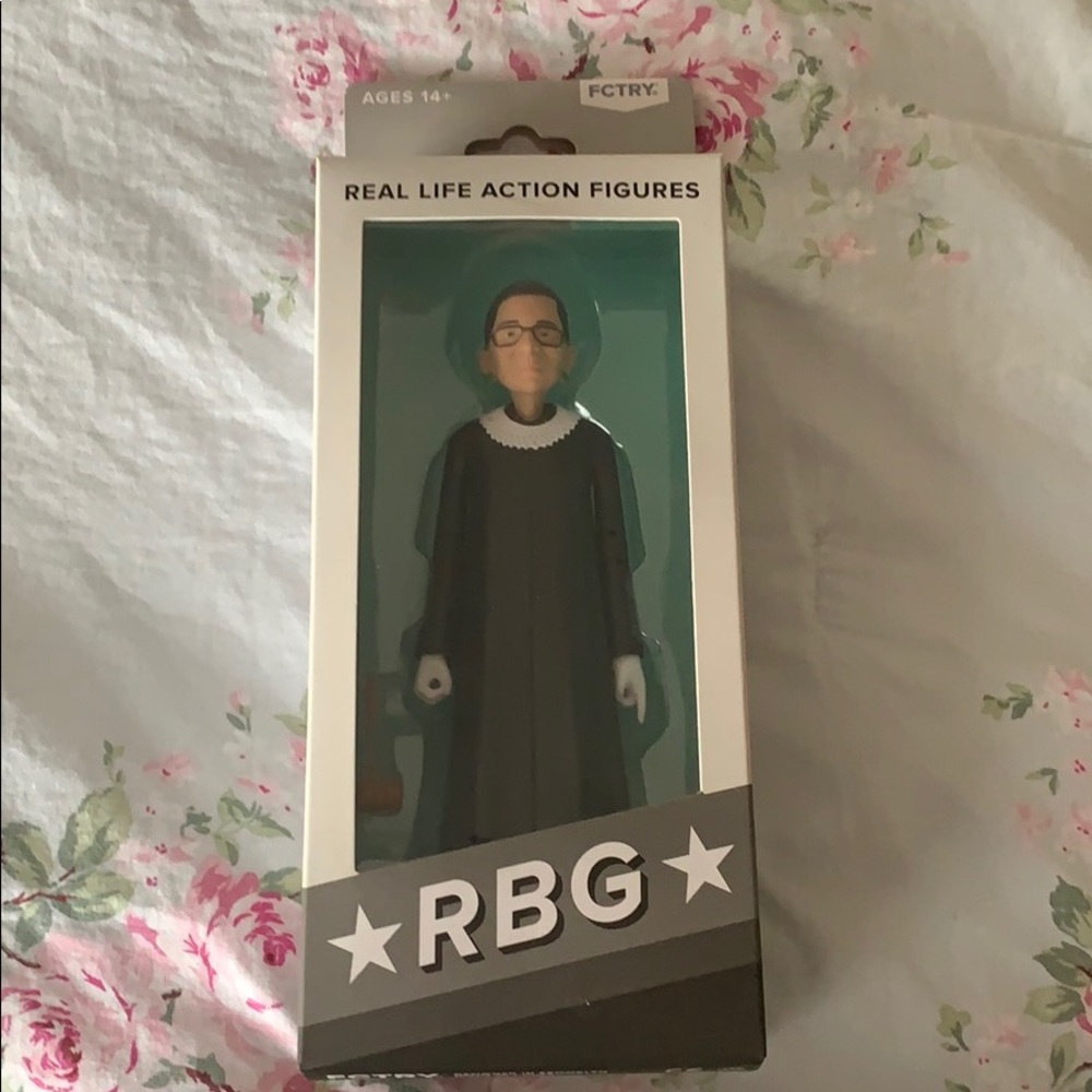 Ruth Bader Ginsburg Action Figure in box.